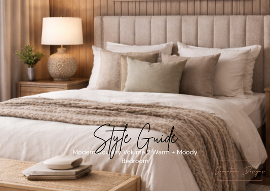 Neatly made bed with pillows and a blanket in a bedroom setting, featuring the text 'Style Guide' and 'Modern + Warm + Moody Bedroom'.