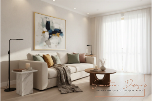 Modern living room with cozy neutral decor and abstract art, perfect for interior design inspiration with Seventeen Designs Logo