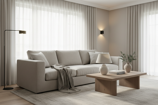 Neutral modern living room with cozy sofa and coffee table, perfect for minimalist home decor inspiration